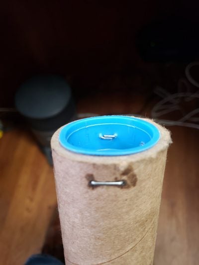 Cylindrical industrial filter with blue plastic cap and metal clipsFRANK – PLANT SUPERVISOR